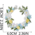 Detail shot of embroidered lemon and floral wreath patch showing size and craftsmanship. - Plant Lemon Floral (X27BK-088-11)