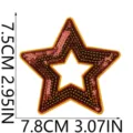 Gros plan détail d'un patch de broderie de sequins d'étoile scintillante avec bordure jaune. - N° 20 (X27WJX-12-20)