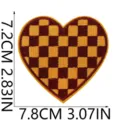 Checkered heart embroidered patch detail showing precise dimensions and fine stitching work. - X27SD-135-28