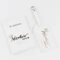 White PU leather passport holder and luggage tag set with gold foil travel quote design. - White