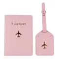 Pink PU leather passport holder and luggage tag set with gold airplane design. - Two-Piece Set / Pink