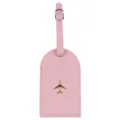 Etichetta per valigia in pelle rosa con emblema aereo dorato per viaggi eleganti. - Rosa