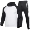 Completo tuta con cappuccio nero e bianco da uomo con maniche raglan e dettagli a righe. - Taglia S / Top e Pantaloni / bianco e nero
