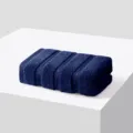 Asciugamano viso in cotone blu scuro con trama a righe, morbido e assorbente per uso quotidiano. - Teal