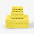 Solid cotton towel set variant in bright yellow, featuring six pieces including bath and face towels. - Lemon Yellow