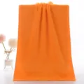 Serviette en coton orange vif, serviette de bain unie douce et absorbante usage quotidien. - 74x33 cm / Orange Clair