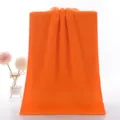 Serviette de bain unie en coton orange, douce et absorbante pour un usage quotidien. - 74x33 cm / Jaune Orangé