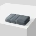 Grey cotton hand towel, soft plain square towel variant for daily home bathroom use. - Elegant Gray