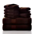 Premium brown cotton towel set, 8-piece absorbent bath and face towels for home bathroom use. - Coffee
