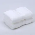 Ensemble de deux serviettes de visage en coton blanc, variante textile douce pour la maison. - Blanc