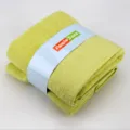 Serviette de bain jacquard unie en pur coton vert écologique avec emballage en papier. - Jaune carambole : 1 serviette de bain et 2 serviettes