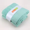 Ensemble de serviettes de bain jacquard en pur coton vert menthe plié avec emballage - Vert bambou : 1 drap de bain et 2 serviettes