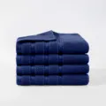 Navy blue cotton towel set of 4, solid color face towels with textured stripe borders. - Teal
