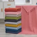 Zuiver katoenen wafelpatroon sjaaldeken en badhanddoek in meerdere kleurvarianten. - Meerkleurig / 180x90cm