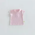 Close-up detail view of infant pink ribbed polo t-shirt collar, front buttons and soft knit fabric. - 73cm / Pink