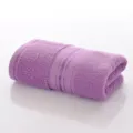 Purple solid color cotton towel variant, soft absorbent hotel style bath towel display. - Wisteria Purple