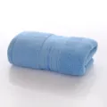Light blue folded cotton towel, soft daily use face or hand towel for home bathroom decor. - Light Blue