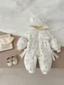 Detailed view of winter baby hooded jumpsuit featuring cute bear ears and soft quilted fabric. - 66cm / Cream White