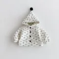 Infant hooded quilted cotton jacket featuring sweet black bow patterns and cute pom-pom detail. - 80cm / Apricot