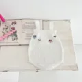 Adorable white knit baby romper with delicate floral embroidery, cozy cotton infant clothing. - 66cm / Baby Romper / Off White
