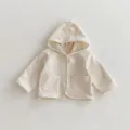Infant hooded cardigan detail shot, neutral beige knit texture fabric with buttons and pockets. - 73cm / Tops / Apricot