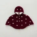 Detail shot of infant hooded cape showing soft fluffy heart patterns and warm winter outerwear. - Red / M (0-1 Years)