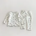 Cozy floral children's sleepwear set detail, long sleeve top and matching lounge pants. - Top And Bottom / Gradient Grey / 66cm