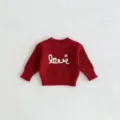 Detailed view of red knit baby sweater featuring cute white love embroidery and cozy texture. - 66cm / Wine Red