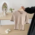 Detail view of baby ribbed long-sleeve top and flared pants set with cute bow. - 73cm / Top And Bottom / Khaki