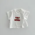 Camiseta de manga corta de algodón para bebé con bonito estampado de letras y botones. - 66cm / Blanco