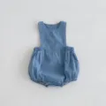 Soft blue denim bubble romper detail, showing elastic waistband and neat stitching. - 66cm / Baby Romper