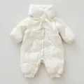 Detailed view of baby winter padded romper in cream white with plush collar and cute knit bow. - 80cm / Long Romper
