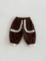 Korean style toddler girl spring corduroy pants with cute white lace ruffles and cuffed hem. - Brown / 66cm