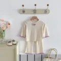 Infant baby girl ribbed thermal top flared pants set detail view, cute purple bow trim. - 73cm / Top And Bottom / Apricot