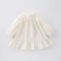 Girls long sleeve princess dress with elegant butterfly embroidery and cute ruffled hem. - 73cm / Apricot
