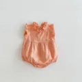 Detailed view of infant summer sleeveless romper featuring ruffled collar and cotton texture. - 80cm / Orange
