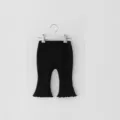 Solid black flared pants for toddler girls, stylish casual cotton trousers with ruffled hem. - 66cm / Black