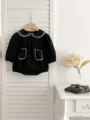 Romper per neonati nero a maniche lunghe con colletto in pizzo bianco e tasche. - Pagliaccetti neri