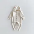 Charming knit baby romper with adorable hood ears and cable pattern details. Soft and cozy. - White Apricot / 66cm