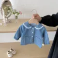 Infant soft denim jacket detail shot, cute sailor collar with lace trim and buttons. - 66cm / Blue