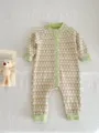Charming knit baby romper featuring a delicate tulip pattern and soft green trim details. - Small Green Flower