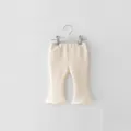 Solid cream children flare pants, elastic waist cotton trousers for baby girls daily wear. - 66cm / Apricot