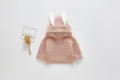 Detailed view of cute pink baby cardigan with plush rabbit ears, warm fleece lining closeup. - 80cm / Tops / Pink Fleece Lined