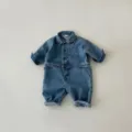 Infant denim baby jumpsuit detail showing the stylish long sleeve romper collar design style. - 73cm / Dark Blue