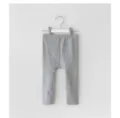 Grey cotton infant leggings detail view, soft and comfortable baby pants with roomy diaper design. - 66cm / Gray