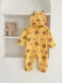 Infant waffle romper detail showing cute squirrel print texture and long sleeve design. - 66cm / Yellow