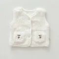 Detailed view of white fleece baby vest with cute plaid bear pocket design for winter - 66cm / White