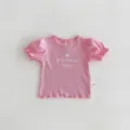 Detalle de camiseta de manga corta para bebé niña rosa, tela de canalé y mangas abullonadas. - 66cm / Rosa
