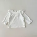 White baby long-sleeve blouse with delicate lace ruffle collar and cute sleeve design. - 66cm / Ruffle Collar Base Tops