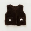 Close-up detail shot of a brown baby fleece vest featuring cute bunny ear pocket accents. - 66cm / Coffee